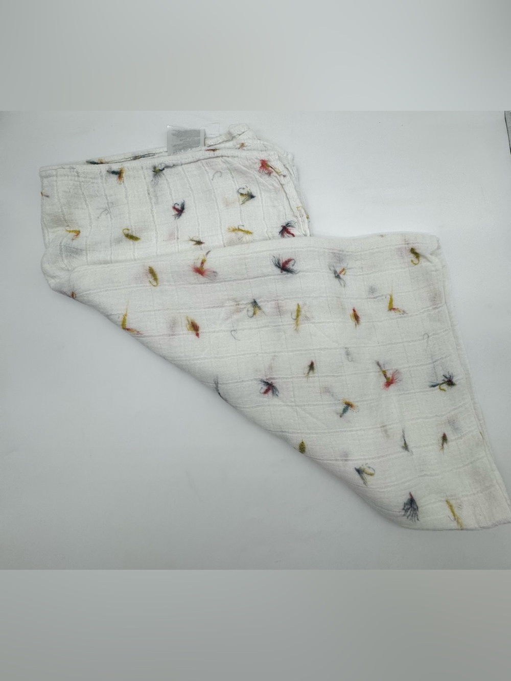 Little Unicorn Muslin Swaddle Blanket in Fishing Lures Print